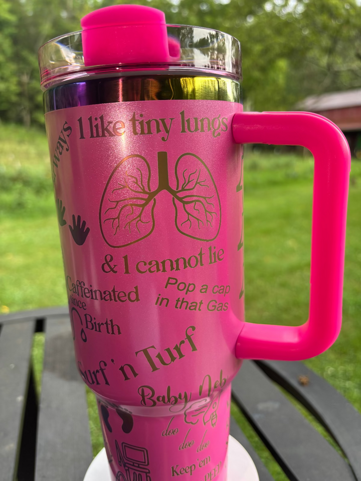 Pink tumbler with text and graphics 
